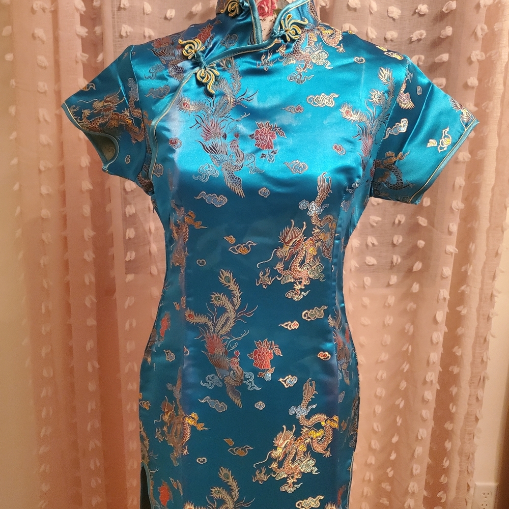 Elegant Blue Midi Dress with Gold Accents